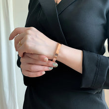 Load image into Gallery viewer, Sabona of London. Plain Rose Gold 7mm Bracelet. Size Medium.